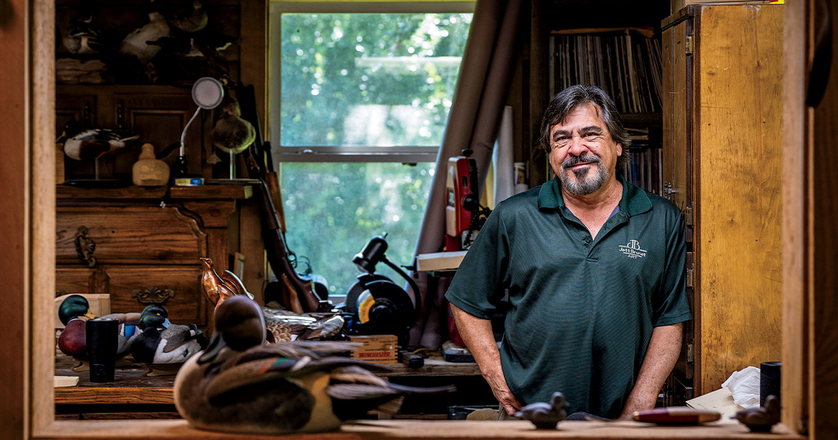 Decoy carver Jett Brunet in his workshop. Photo by  Zach Eshleman, DU